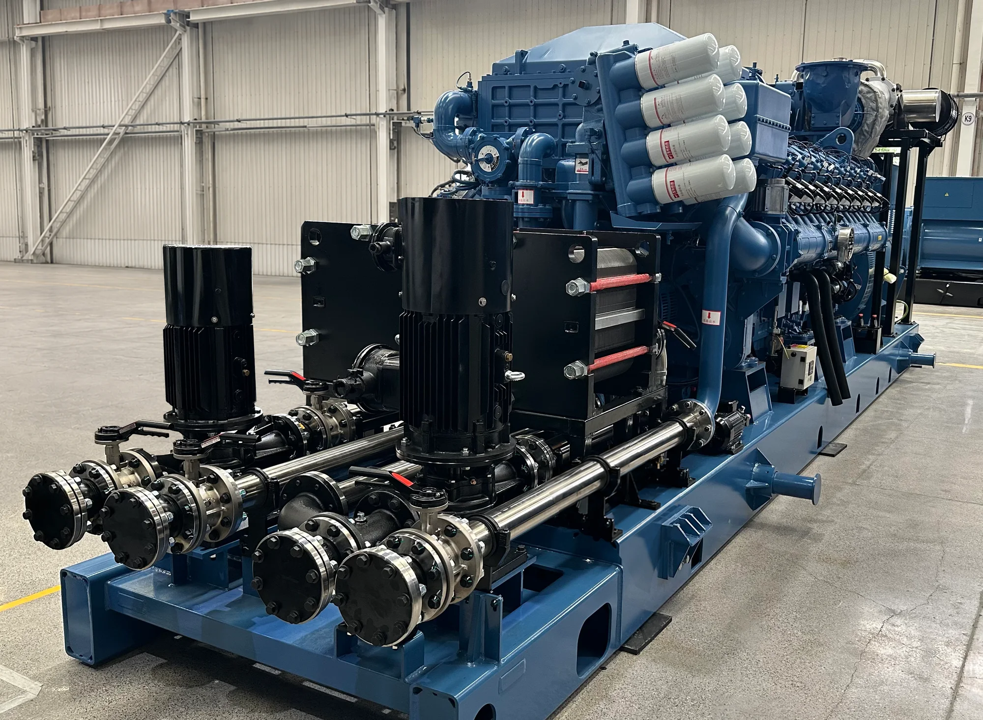 Gas engine generator with pipework and auxiliary equipment